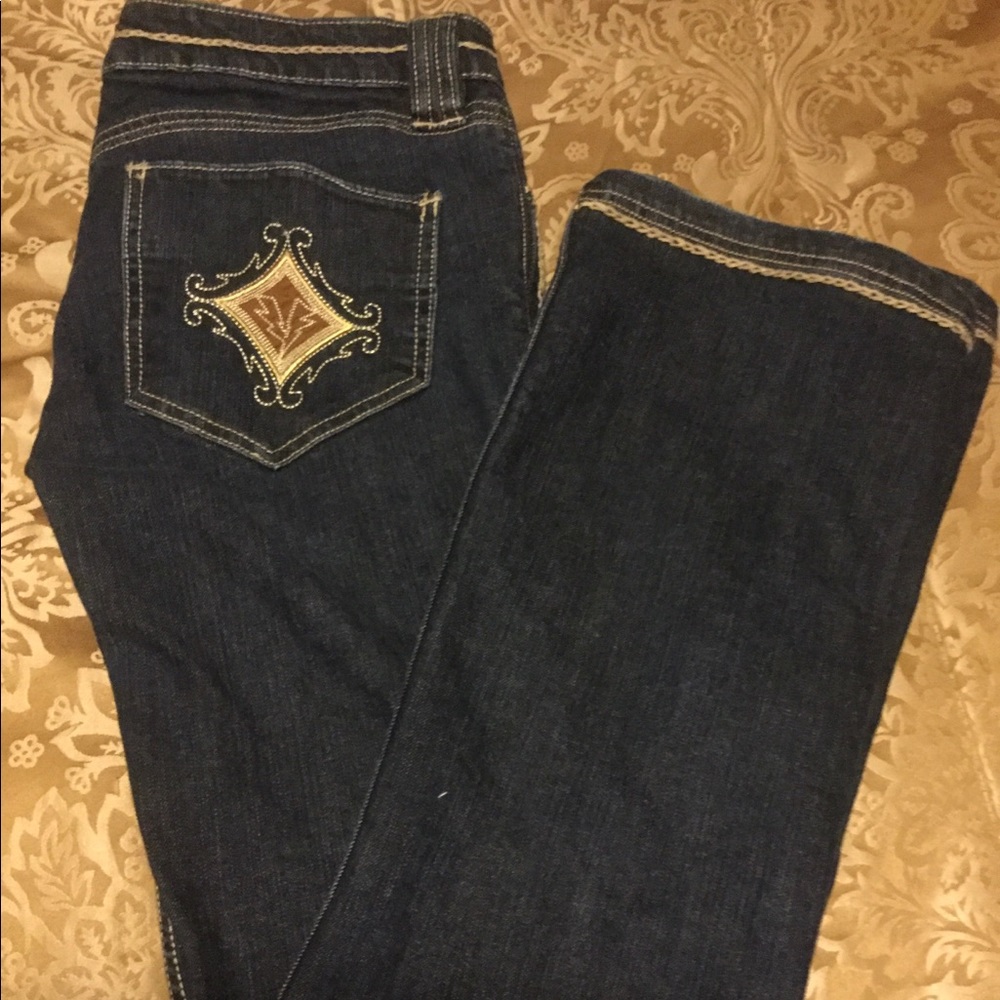 ROCK REVOLUTION JEANS WITH DECOR ON POCKETS.SZ 32.